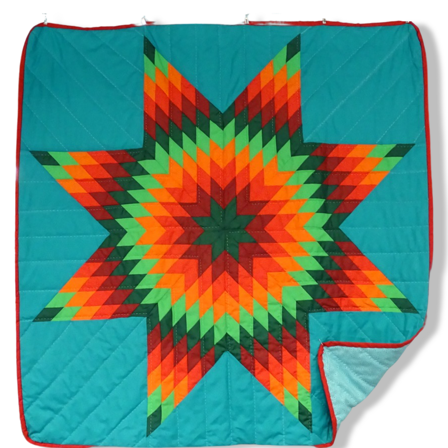 AW Teal Reds and Green Baby Star Quilt